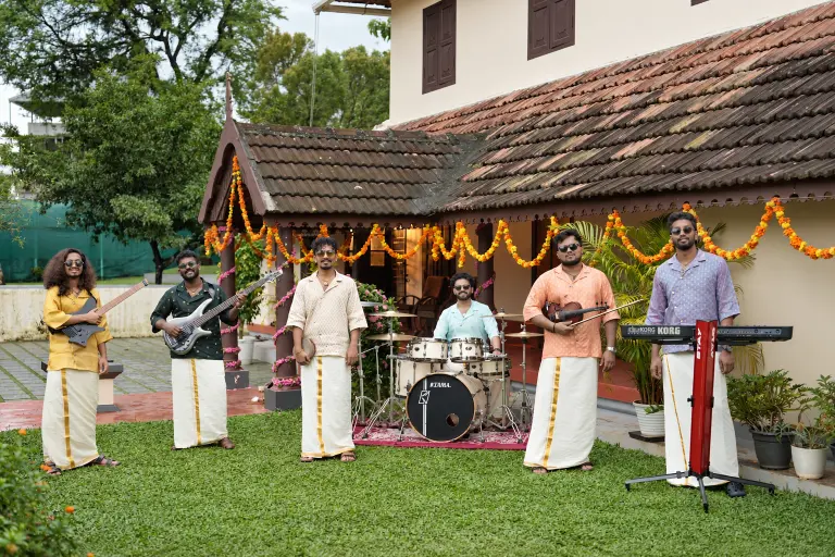 20Hz Live band musicians performing with guitar, bass, drums, violin and keyboard